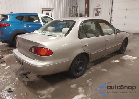 2001 Toyota Corolla Le z USA, uszkodzony, nr VIN 2T1BR12E61C453995